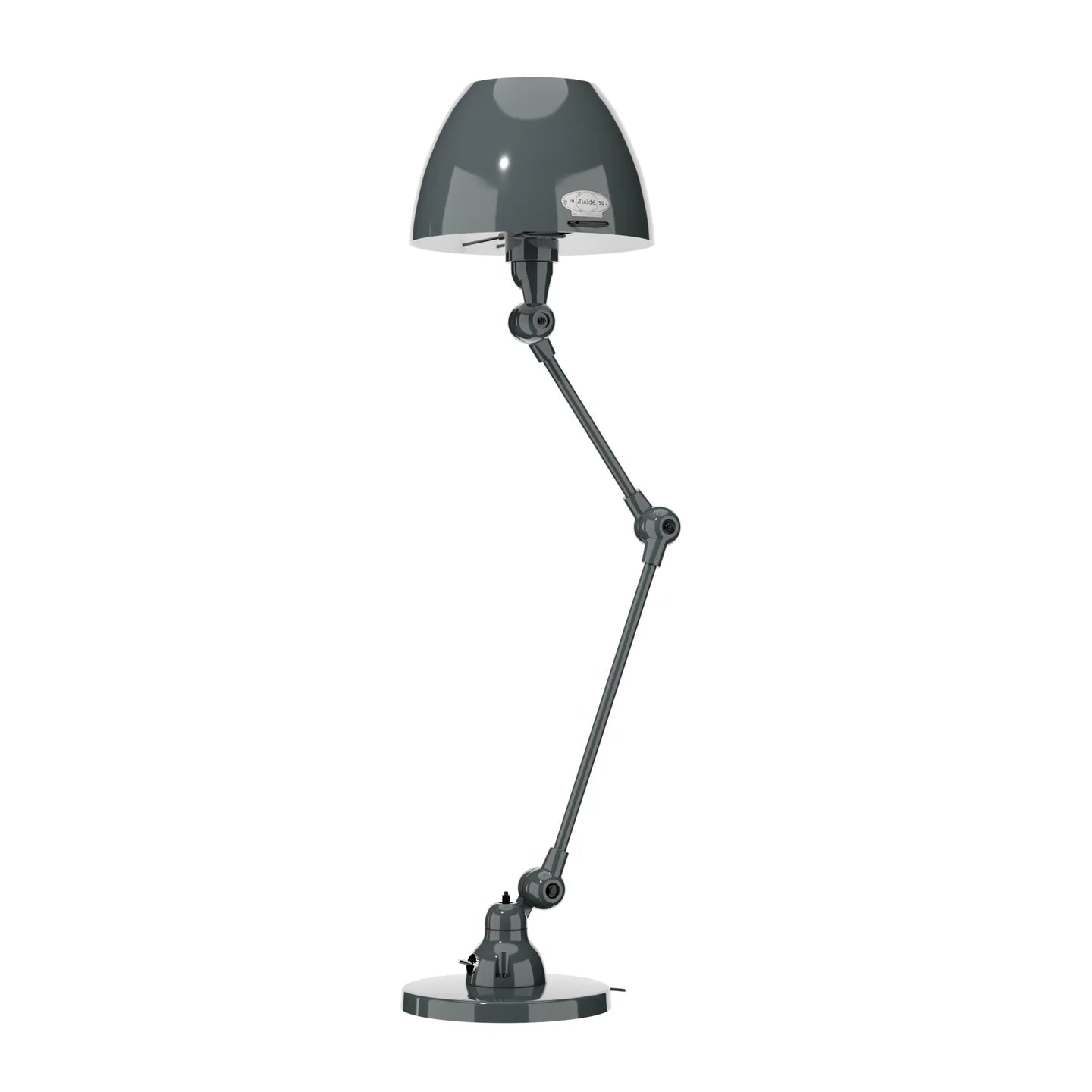 La Lampe de bureau articulée Aicler design professionnel de Monsieur Bureau est dotée d'un abat-jour en forme de dôme gris brillant, d'un double bras réglable et d'une base ronde. Elle est idéale pour les espaces professionnels nécessitant un éclairage directionnel. Présentée à la verticale sur fond blanc.#finitions_gris_granit