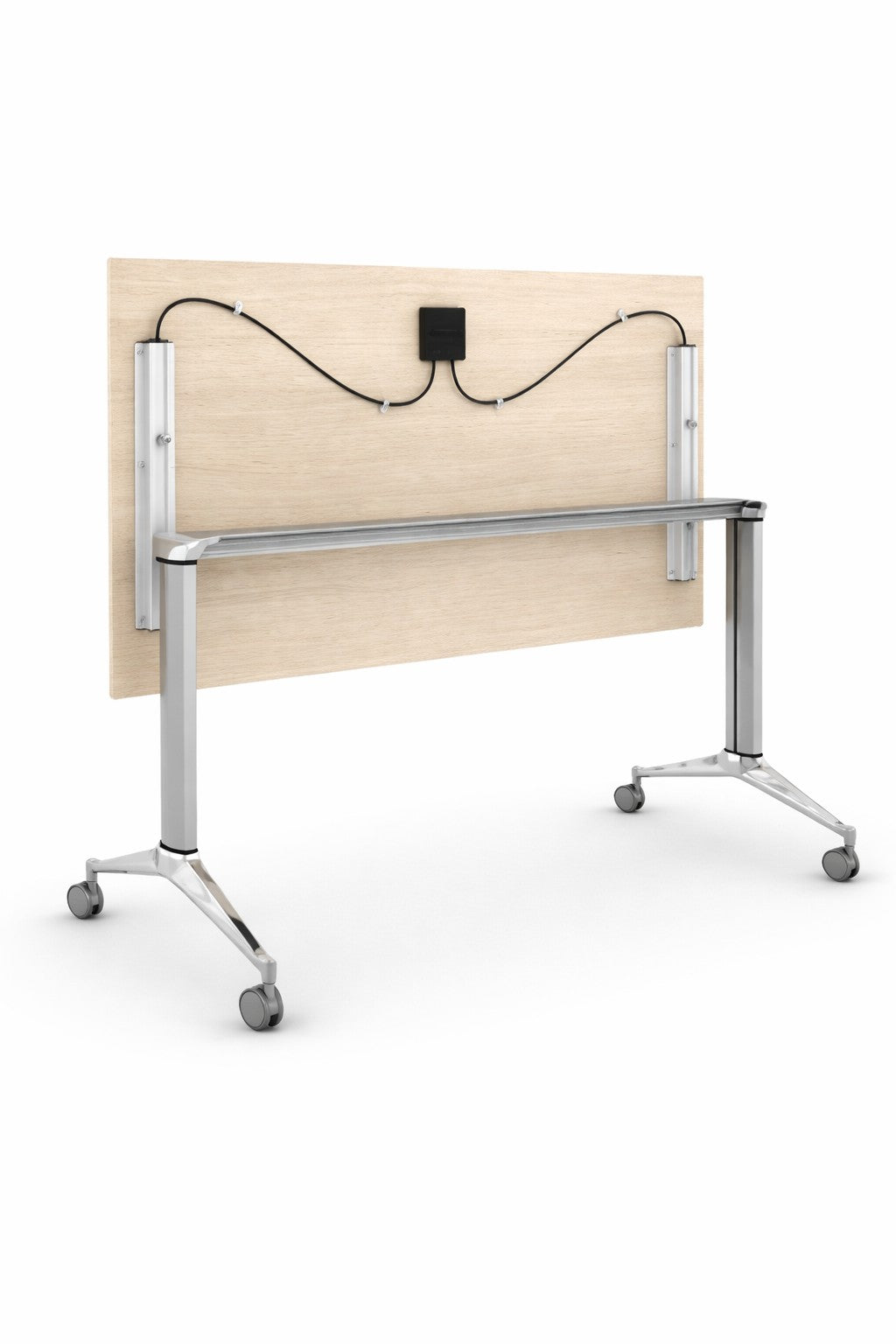 La Table abattante Mobile sur roulettes de Monsieur Bureau se caractérise par un plateau en bois clair, des pieds en métal avec roulettes, un passage de câbles visible sous le plateau, et est présentée de dos.